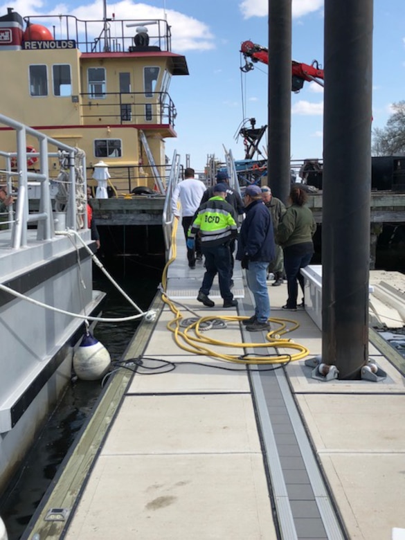 After rescuing a boater from his disabled vessel in the Chesapeake Bay Thursday April 5, 2018, the crew of Survey Vessel CATLETT brought him back to the U.S. Army Corps of Engineers’ facility at Fort McHenry where local emergency medical services personnel assisted him further. The U.S. Army Corps of Engineers crews of the CATLETT was conducting a routine condition survey of the Tolchester Channel when she responded to a mayday call, rescuing the boater from his disabled vessel in the Chesapeake Bay.