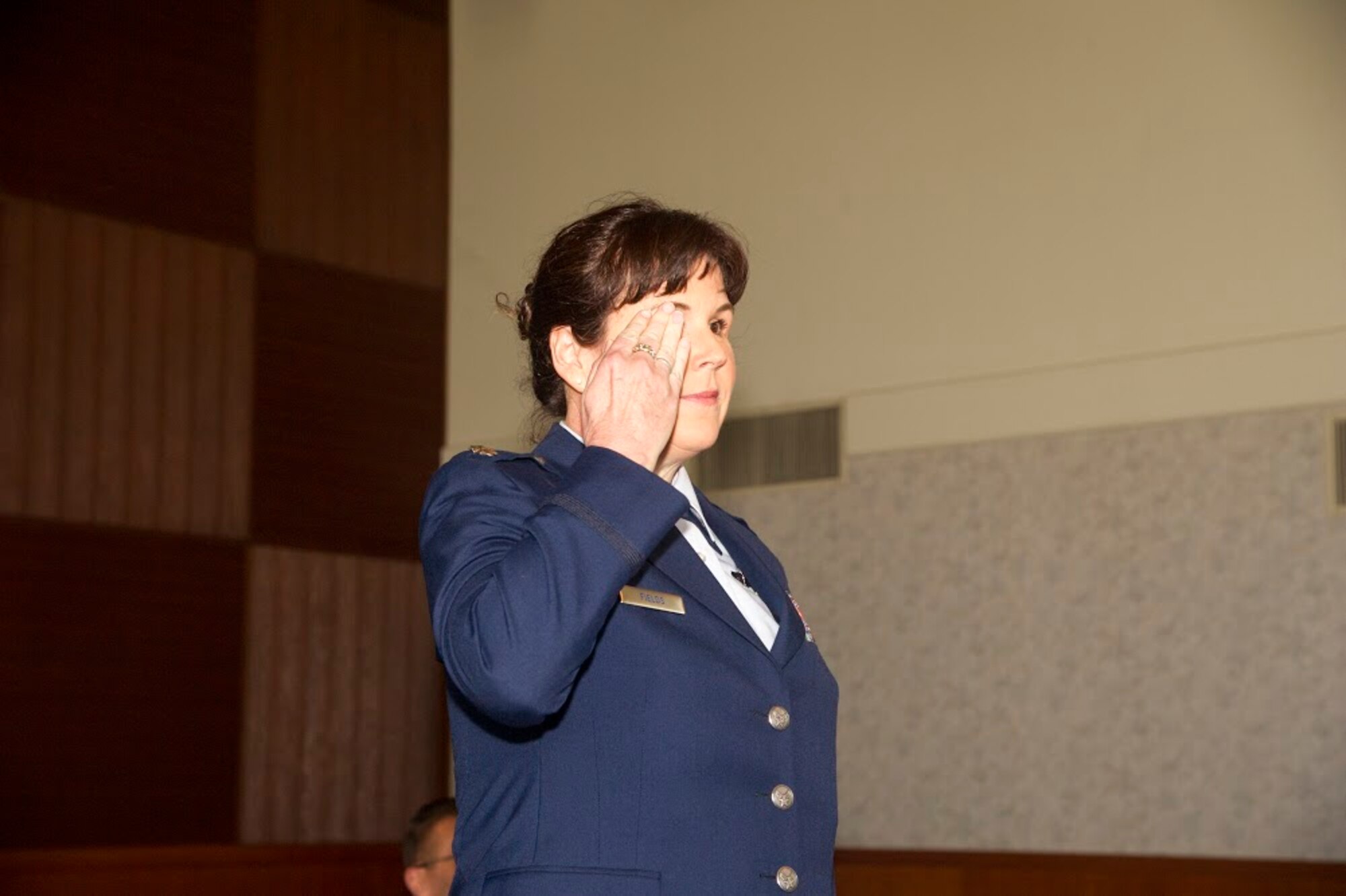Lt. Col. Summer A. Fields gives her first salute as the commander of the 13th Reconnaissance Squadron April 7 at Beale Air Force Base, California.