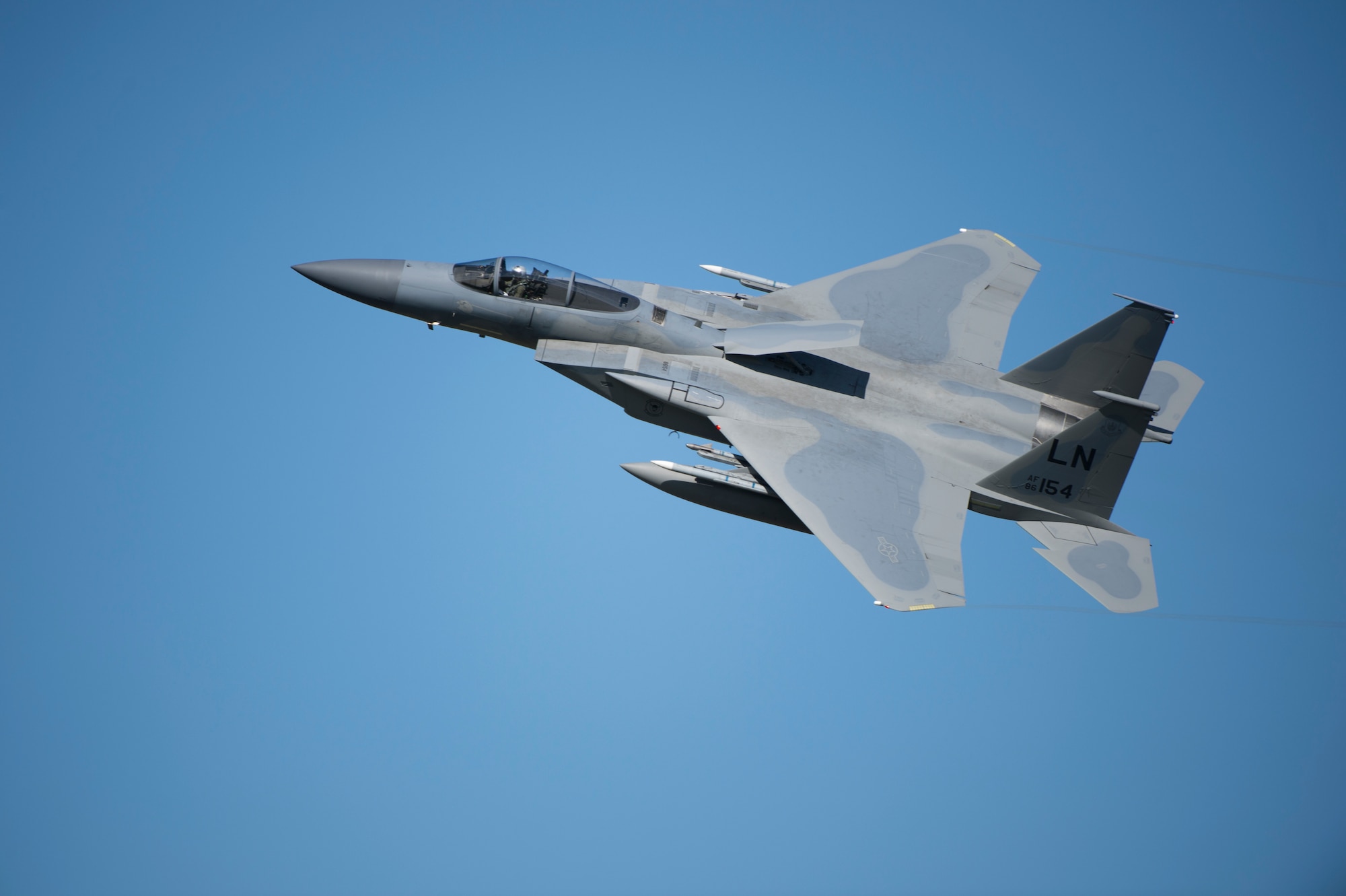 An F-15C Eagle assigned to the 493rd Fighter Squadron flies above Royal Air Force Lakenheath, England, April 5, 2018. The squadron maintains the ability to rapidly generate, deploy and sustain operations to execute wartime and peacetime taskings in any theater of operations around the world. (U.S. Air Force photo/ Senior Airman Malcolm Mayfield)