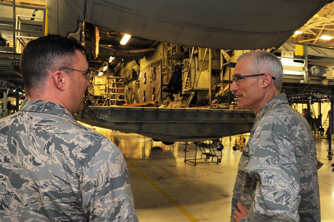 Maj. Gen. Craig La Fave, the 22nd Air Force commander, speaks with Maj. John Fite, the 302nd Maintenance Squadron commander, while visiting 302nd Airlift Wing Reserve Citizen Airmen at Peterson Air Force Base, April 8, 2018. La Fave spent part of the morning learning about the squadron’s challenges and accomplishments. (U.S. Air Force photo by Staff Sgt. Frank Casciotta)