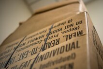 Boxes filled with meals, ready to eat (MREs) sit before an MRE open-package inspection, April 6, 2018, at Moody Air Force Base, Ga. Airmen from the 23d Aerospace Medicine Squadron Public Health Flight examine the MREs for defects and overall quality and determine whether they’ll be utilized here, at other bases or to condemn the batch. Public Health monitors more than 8,400 MREs yearly to ensure they are safe and fit for consumption, so as to maintain a healthy fighting force. (U.S. Air Force photo by Airman 1st Class Erick Requadt)