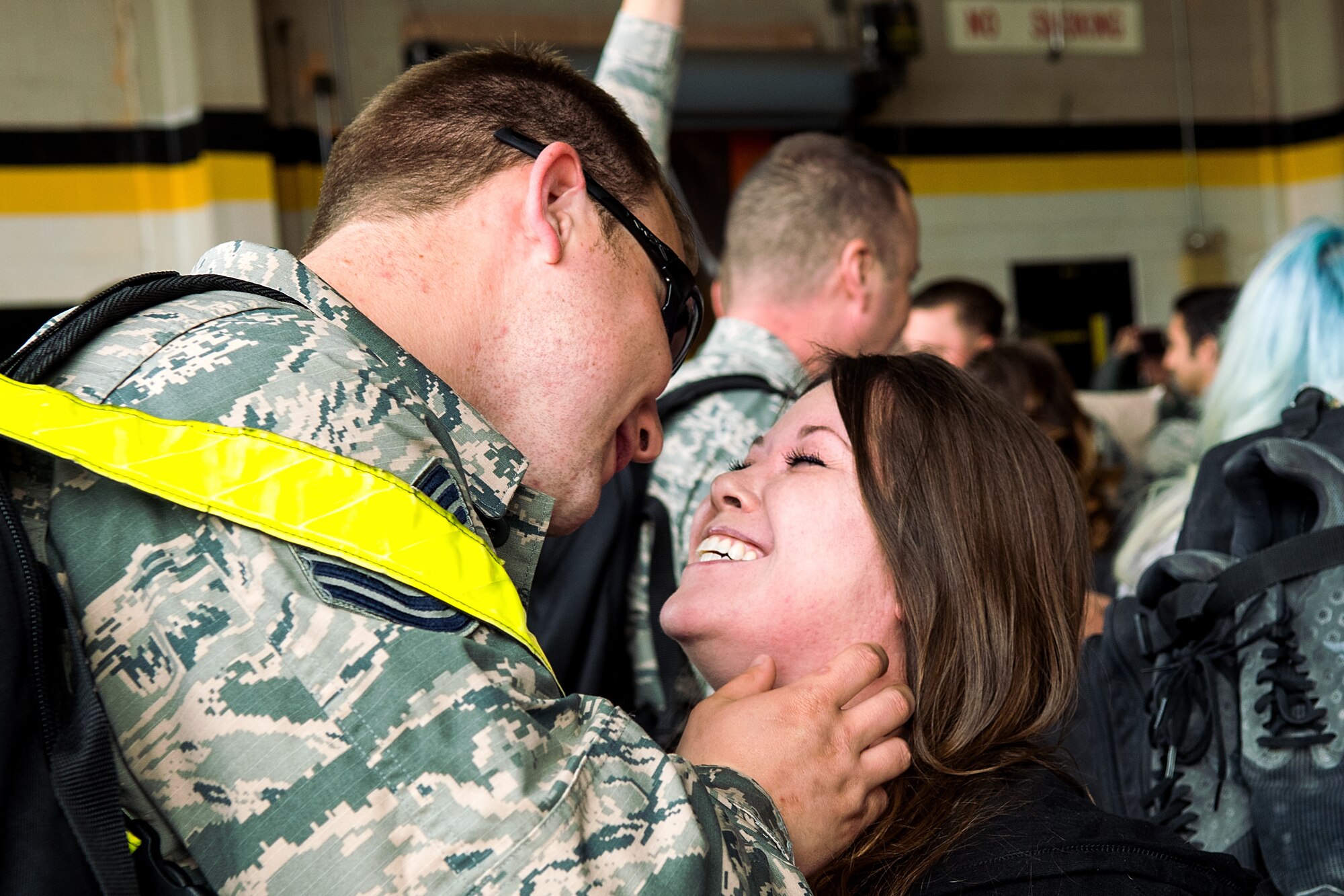 An Airman from the 4th Fighter Wing greets his spouse upon returning from deployment, April 10, 2018, at Seymour Johnson Air Force Base, North Carolina.