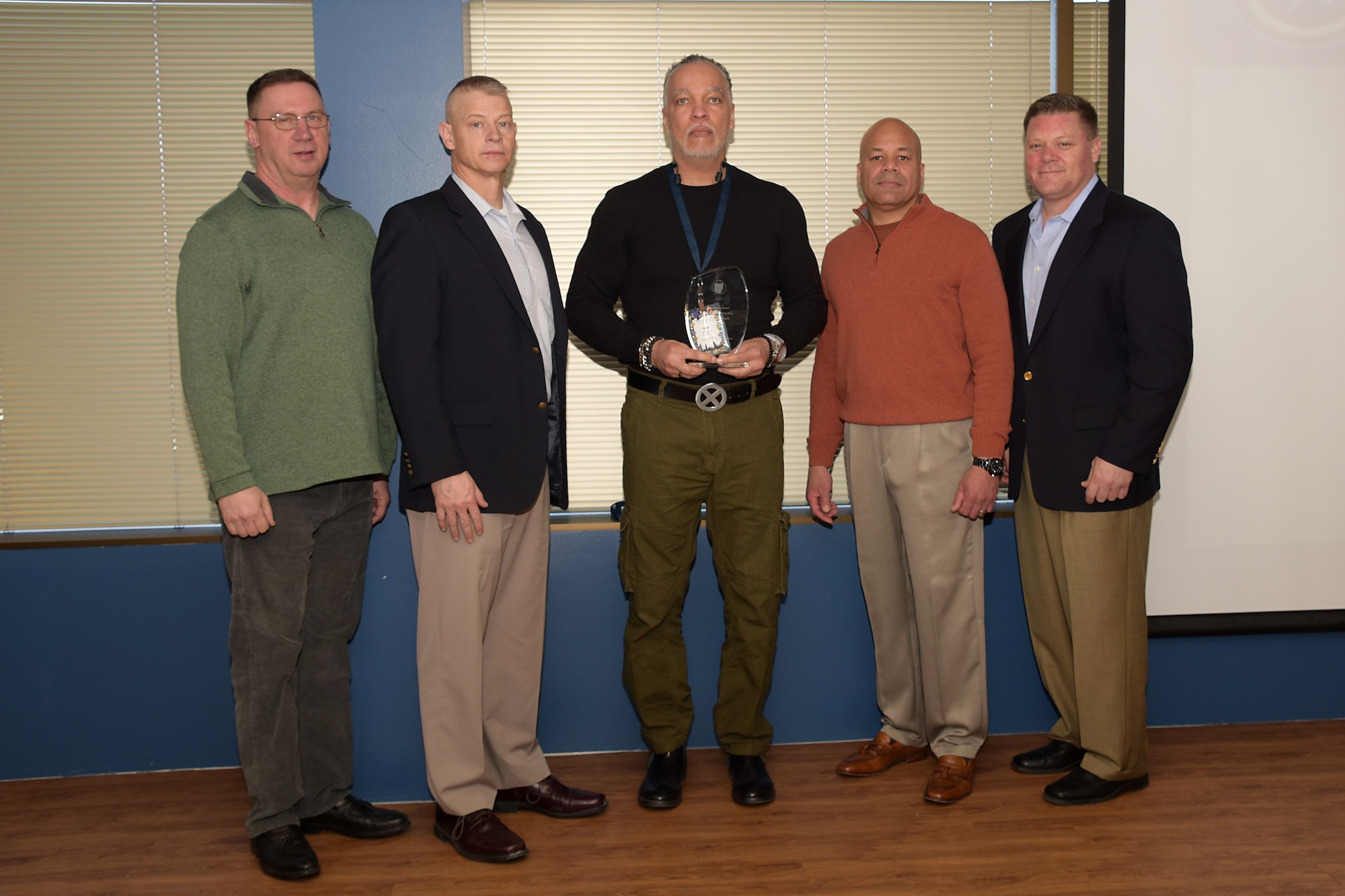 Robert Williams earns the Volunteer of the Year award at the Joint Family Readiness and Warrior Support Professional Development Volunteer Workshop in Columbus, Ohio, April 8, 2018. Volunteers saved the Ohio National Guard nearly half a million dollars through their unpaid work.