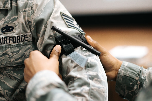 Senior Airman Dean Adamczyk, 11th Civil Engineer Squadron fire inspector, places a tourniquet onto Staff Sgt. Michael Wilson, Air Force Legal Operations Agency paralegal, during a bleeding control kit training session at the base theater on Joint Base Andrews, Md., March 29. 2018. During the training, personnel learned hands-on lifesaving skills utilizing resources located in each bleeding control kit. Each included gloves, gauze, trauma dressing, sheers, tourniquets and easy-to-follow instructions.