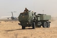 Soldiers of Alpha Battery, 2nd Battalion, 130th Field Artillery, 75th Field Artillery Brigade, 35th Infantry Division, from the Kansas National Guard, work with U.S. Air Force crew to load two M142 High Mobility Artillery Rocket Systems (HIMARS), pre-dawn, in preparation for the Operation Diamond Torrent exercise, at an airbase in the United Arab Emirates, Jan. 21. Operation Diamond Torrent demonstrated the capabilities of the C-17 and the HIMARS as an operational strategic strike package that can rapidly deploy and infiltrate to deliver a fast, flexible and lethal combination where ever needed.