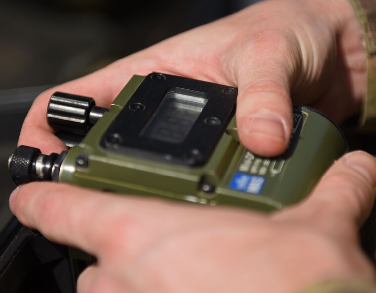 U.S. Air Force Airman 1st Class Zackary Stringer, 20th Civil Engineer Squadron explosive ordinance disposal apprentice, prepares a remote firing system to detonate hazardous items from a safe distance in Conway, S.C., April 4, 2018.