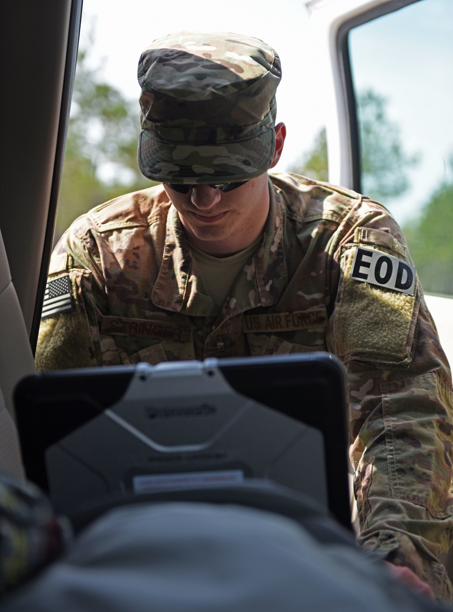 U.S. Air Force Airman 1st Class Zackary Stringer, 20th Civil Engineer Squadron explosive ordinance disposal (EOD) apprentice, identifies ordnance using a specialized database in Conway, S.C., April 4, 2018.