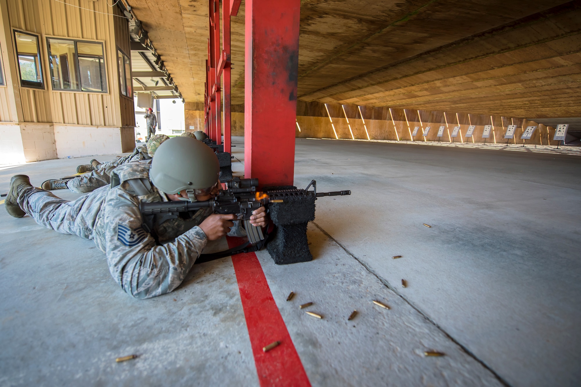 Tech. Sgt. Jonathon Tyler, 23d Maintenance Group munitions specialist, fires an M4 carbine during a Combat Arms Training and Maintenance (CATM) class, April 3, 2018, at Moody Air Force Base, Ga. Airmen must demonstrate quality safety standards while handling and shooting their weapons proficiently in order to be eligible to deploy. Throughout the class the instructors emphasized: weapon handling techniques, proper sight usage and internal weapon cleaning procedures. (U.S. Air Force photo by Airman Eugene Oliver)