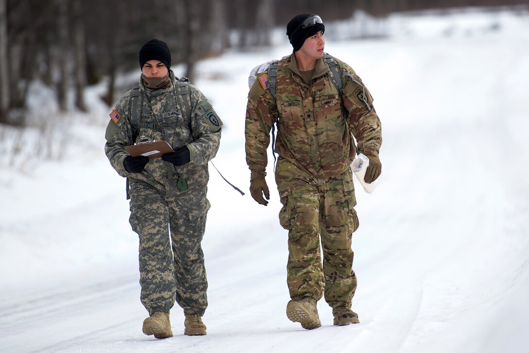 Soldiers move out to their next point during land navigation training.