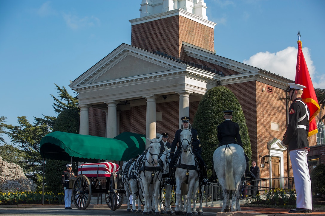 Members of the U.S. Army Caisson Platoon prepare to escort the remains of Maj. Gen. John A. Studds during a full honors funeral for Studds at Arlington National Cemetery, Arlington, Virginia April 10, 2018. General Studds was commissioned into the Marine Corps in 1960 and served the following 33 years as an Infantry Officer. He commanded Marines at all levels including; Commander, Charlie Company, 3rd Reconnaissance Battalion in Vietnam where he received the Bronze Star with Combat "V" for valor and was the Director of Marine Corps Intelligence during Operations Desert Shield and Desert Storm. Studds concluded his devout career as the Commanding General, Marine Corps Recruit Depot, San Diego. (Official U.S. Marine Corps photo by Sgt. Robert Knapp/Released)