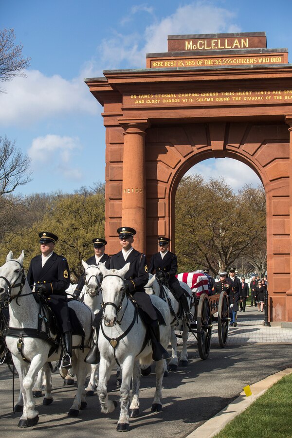 Members of the U.S. Army Caisson Platoon escort the remains of Maj. Gen. John A. Studds during a full honors funeral for Studds at Arlington National Cemetery, Arlington, Virginia, April 10, 2018. General Studds was commissioned into the Marine Corps in 1960 and served the following 33 years as an Infantry Officer. He commanded Marines at all levels including; Commander, Charlie Company, 3rd Reconnaissance Battalion in Vietnam where he received the Bronze Star with Combat "V" for valor and was the Director of Marine Corps Intelligence during Operations Desert Shield and Desert Storm. Studds concluded his devout career as the Commanding General, Marine Corps Recruit Depot, San Diego. (Official U.S. Marine Corps photo by Sgt. Robert Knapp/Released)
