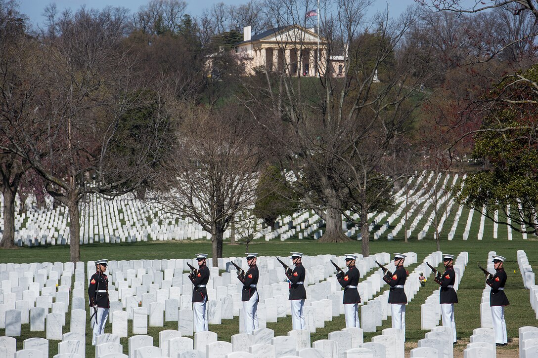 A firing party with Marine Barracks Washington D.C. renders a three-volley salute during a full honors funeral for Maj. Gen. John A. Studds at Arlington National Cemetery, Arlington, Virginia, April 10, 2018. General Studds was commissioned into the Marine Corps in 1960 and served the following 33 years as an Infantry Officer. He commanded Marines at all levels including; Commander, Charlie Company, 3rd Reconnaissance Battalion in Vietnam where he received the Bronze Star with Combat "V" for valor and was the Director of Marine Corps Intelligence during Operations Desert Shield and Desert Storm. Studds concluded his devout career as the Commanding General, Marine Corps Recruit Depot, San Diego. (Official U.S. Marine Corps photo by Sgt. Robert Knapp/Released)