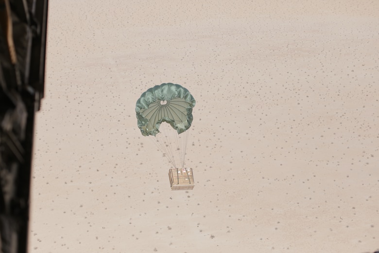Units of blood descend from the sky during an air delivery drop at Marine Corps Air Station Yuma, Ariz., March 28, 2018. The training was conducted to test new delivery methods for units of blood to units who are deployed to austere environments.