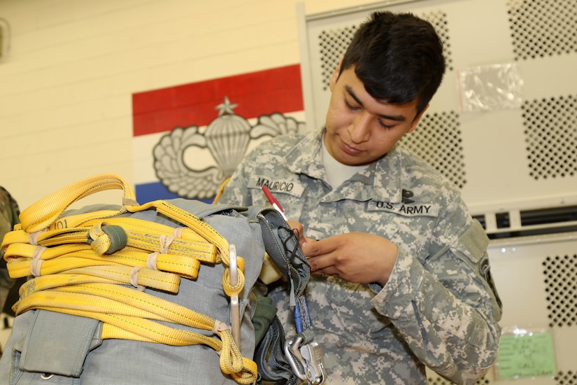 Parachute riggers focused on providing safe landings