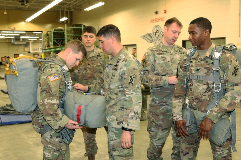 Parachute riggers focused on providing safe landings