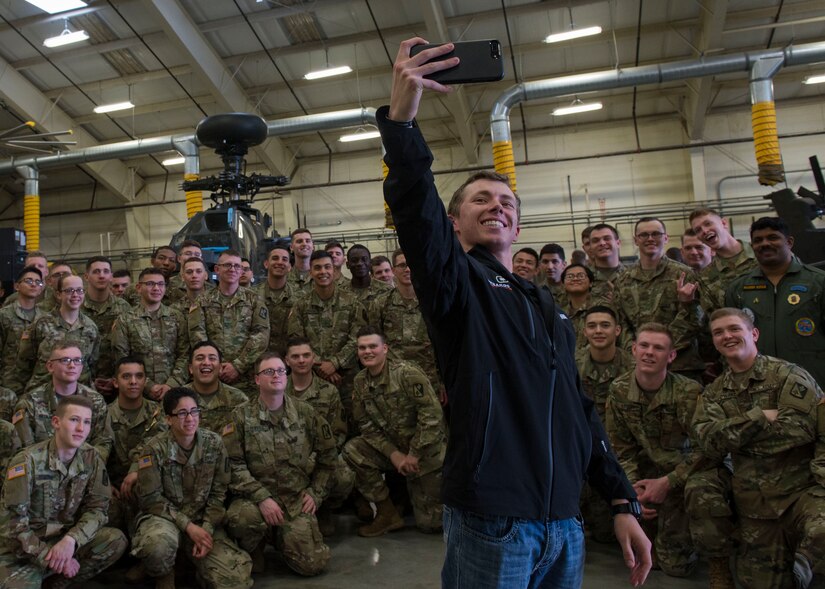 NASCAR driver Brandon Jones takes a selfie with U.S. Army Soldiers in training in Fort Eustis’ 128th Aviation Brigade schoolhouse at Joint Base Langley-Eustis, Virginia, April 4, 2018. The Soldiers were able to ask Jones questions about his profession and his work ethic that got him into NASCAR. (U.S. Air Force photo by Airman 1st Class Monica Roybal)