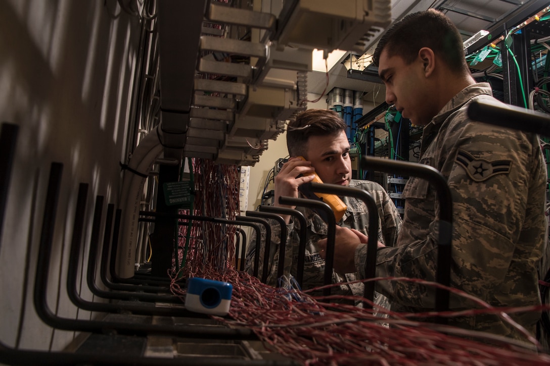 Airmen work with the 179th Airlift Wing Communications Flight that was presented with the Air Force Lieutenant General Harold W. Grant award for best communication flight in Air National Guard, January 26, 2018, Mansfield, Ohio (U.S. Air National Guard/Joe Harwood)