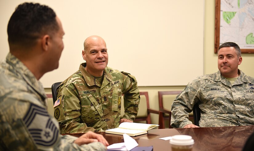 From left, U.S. Air Force Chief Master Sgt. Luis Reyes, Army & Air Force Exchange Service’s senior enlisted advisor, and U.S. Army Command Sgt. Maj. Eric Vidal, 733rd Mission Support Group command sergeant major, discuss health initiatives at AAFES’ restaurants, Expresses and main Exchanges during Reyes’ visit to Joint Base Langley-Eustis, Virginia, April 10-12, 2018.