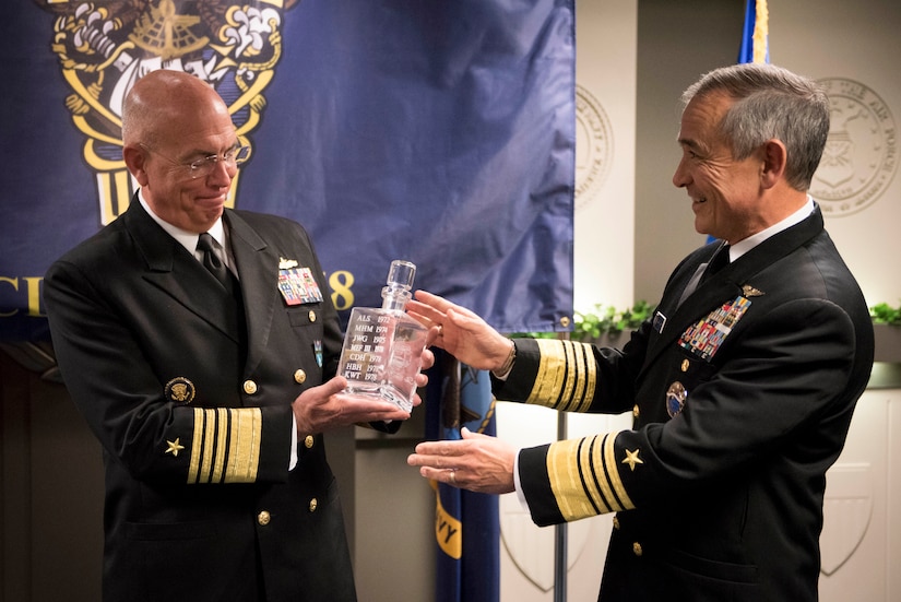 Navy leaders pose for a photo.