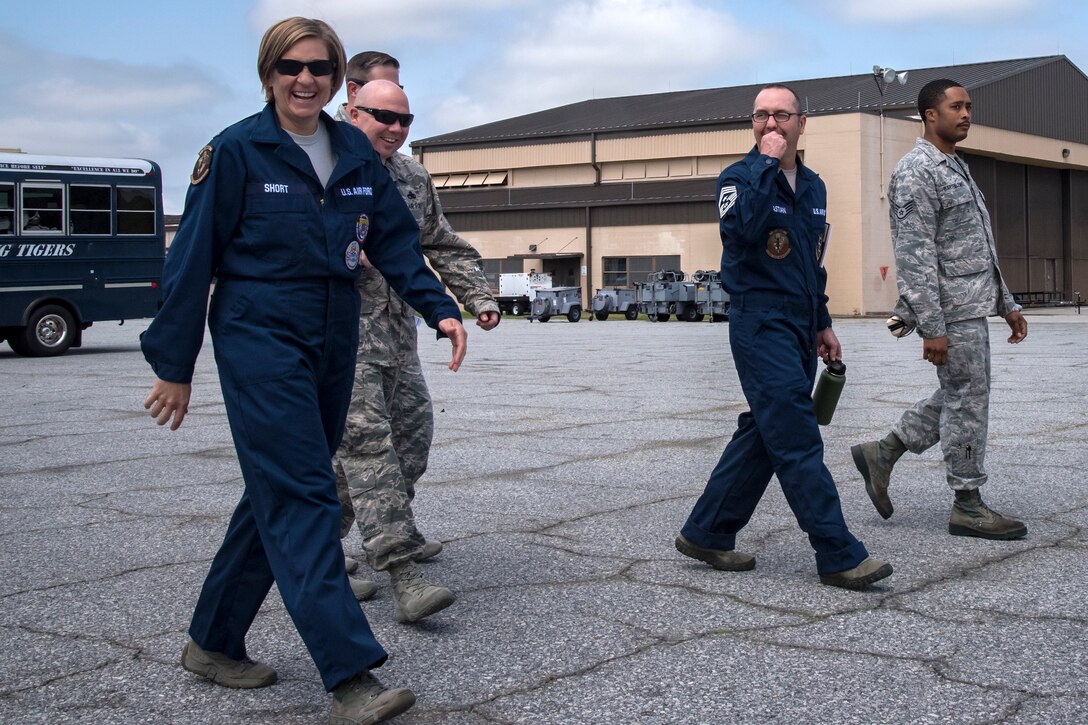 Airmen from the 23d Aircraft Maintenance Squadron (AMXS) and leadership from the 23d Wing, walk the flight line during an immersion tour, April 9, 2018, at Moody Air Force Base, Ga. Moody’s leadership toured the 23d AMXS to get a better understanding of their overall mission, capabilities, and comprehensive duties. (U.S. Air Force photo by Airman Eugene Oliver)