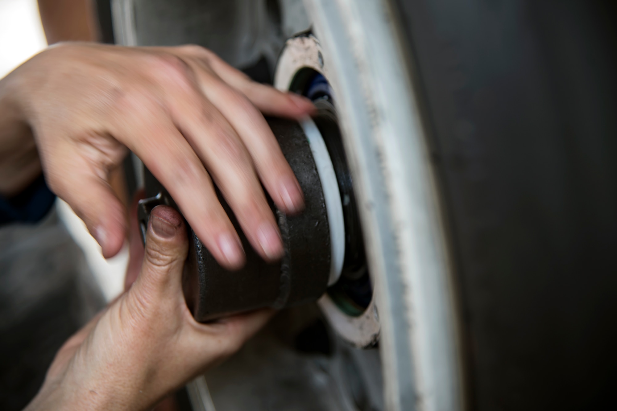 Col. Jennifer Short, 23d Wing commander, twists the wheel casing of an A-10C Thunderbolt II during an immersion tour, April 9, 2018, at Moody Air Force Base, Ga. Moody’s leadership toured the 23d Aircraft Maintenance Squadron to get a better understanding of their overall mission, capabilities, and comprehensive duties. (U.S. Air Force photo by Airman Eugene Oliver)