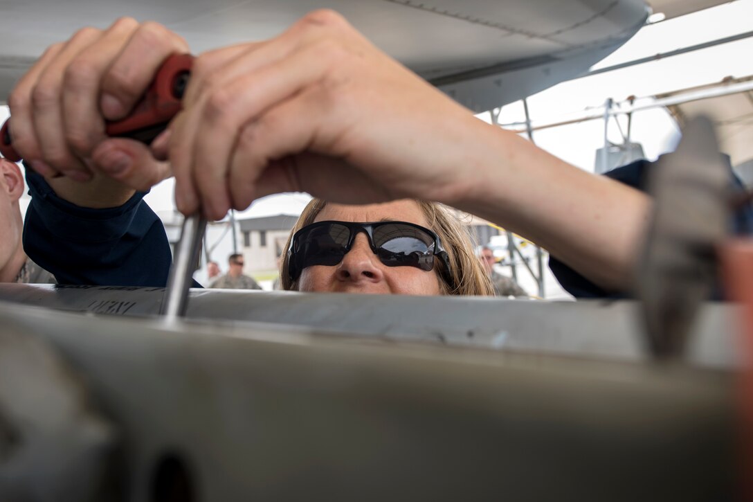 Col. Jennifer Short, 23d Wing commander, screws a component into an A-10C Thunderbolt II during an immersion tour, April 9, 2018, at Moody Air Force Base, Ga. Moody’s leadership toured the 23d Aircraft Maintenance Squadron to get a better understanding of their overall mission, capabilities, and comprehensive duties. (U.S. Air Force photo by Airman Eugene Oliver)