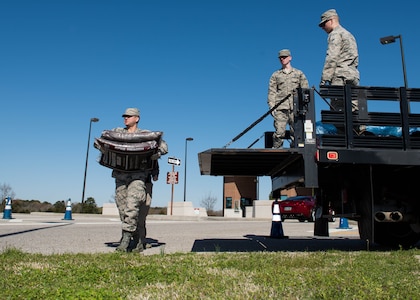 Volunteers deliver mulch to the different Filterra stations at Joint Base Langley-Eustis, Va., April 5, 2018.