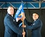Col. Leo J. Kamphaus, Jr., commander of the 920th Maintenance Group and Maj. Chad P. Fuentes, commander of the 920th Aircraft Maintenance Squadron (AMXS) both hold the 920th Aircraft Maintenance Squadron guidon during the 920th AMXS assumption of command ceremony.
