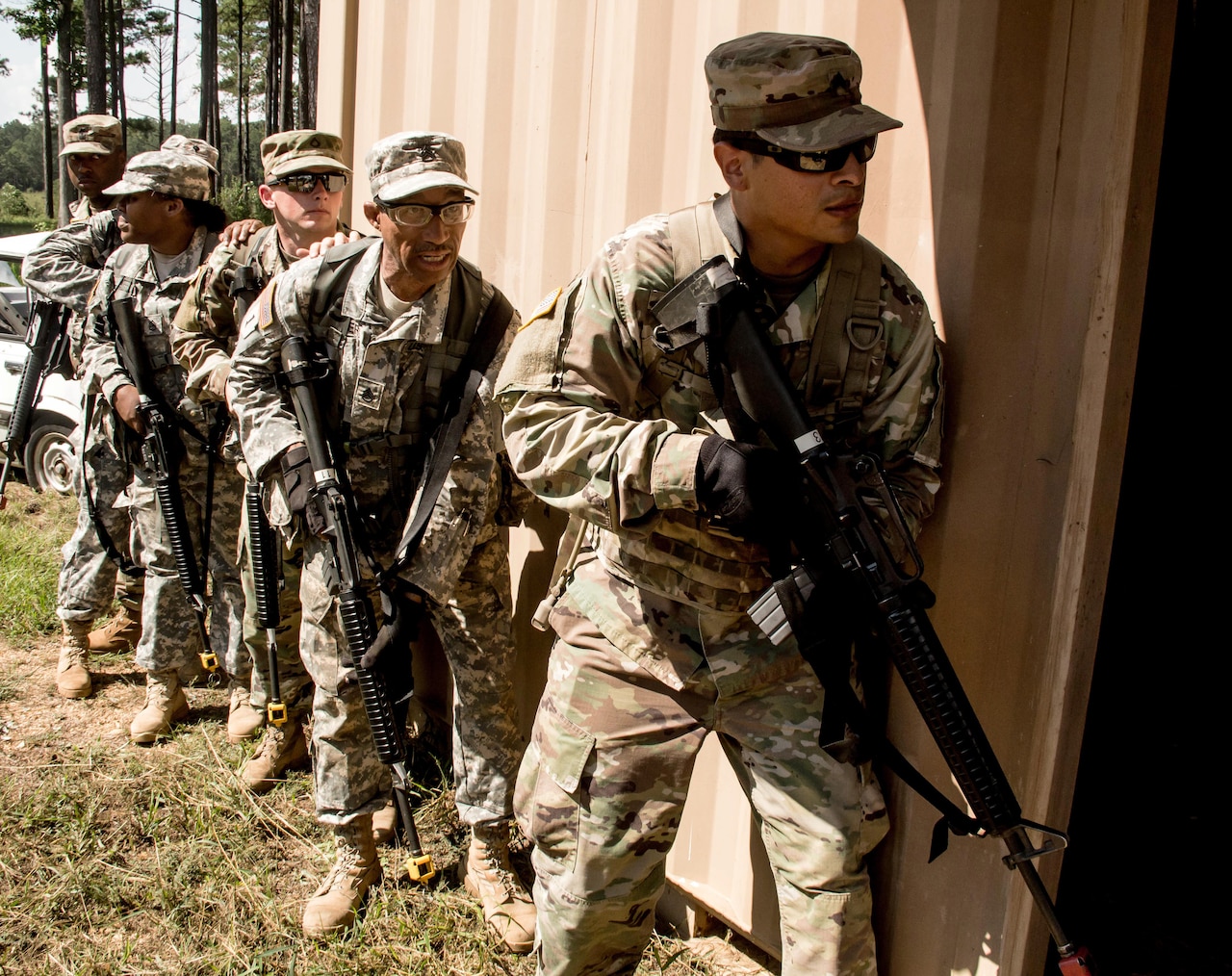 Soldiers prepare to clear a building during an urban operations familiarization event at Fort McClellan, Ala.