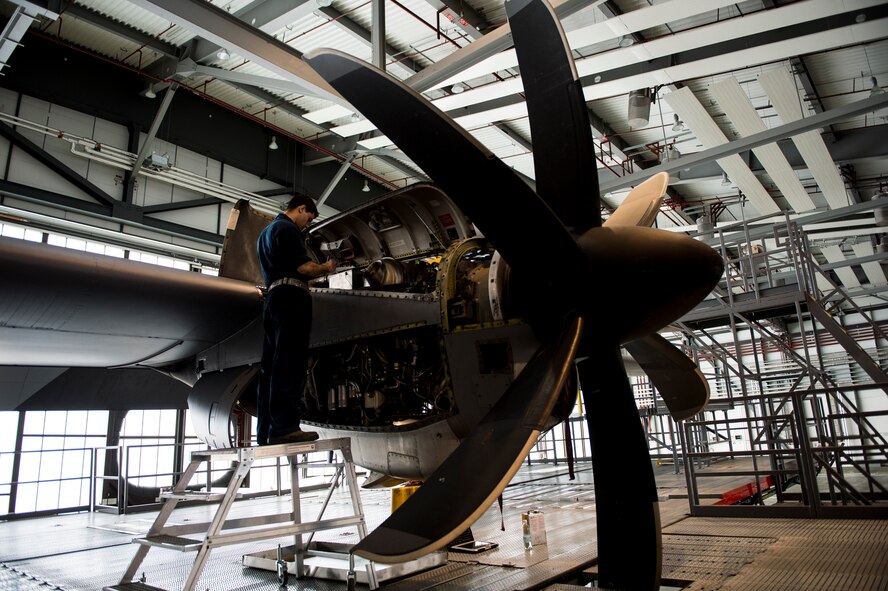 U.S. Air Force Senior Airman Johann Caballero, 86th Maintenance Squadron aerospace propulsion journeyman, performs maintenance on the engine of a C-130J Super Hercules on Ramstein Air Base, Germany, April 10, 2018. The most thorough kinds of inspections involve cleaning and opening the aircraft, and repairing or replacing parts as needed. (U.S. Air Force photo by Senior Airman Joshua Magbanua)