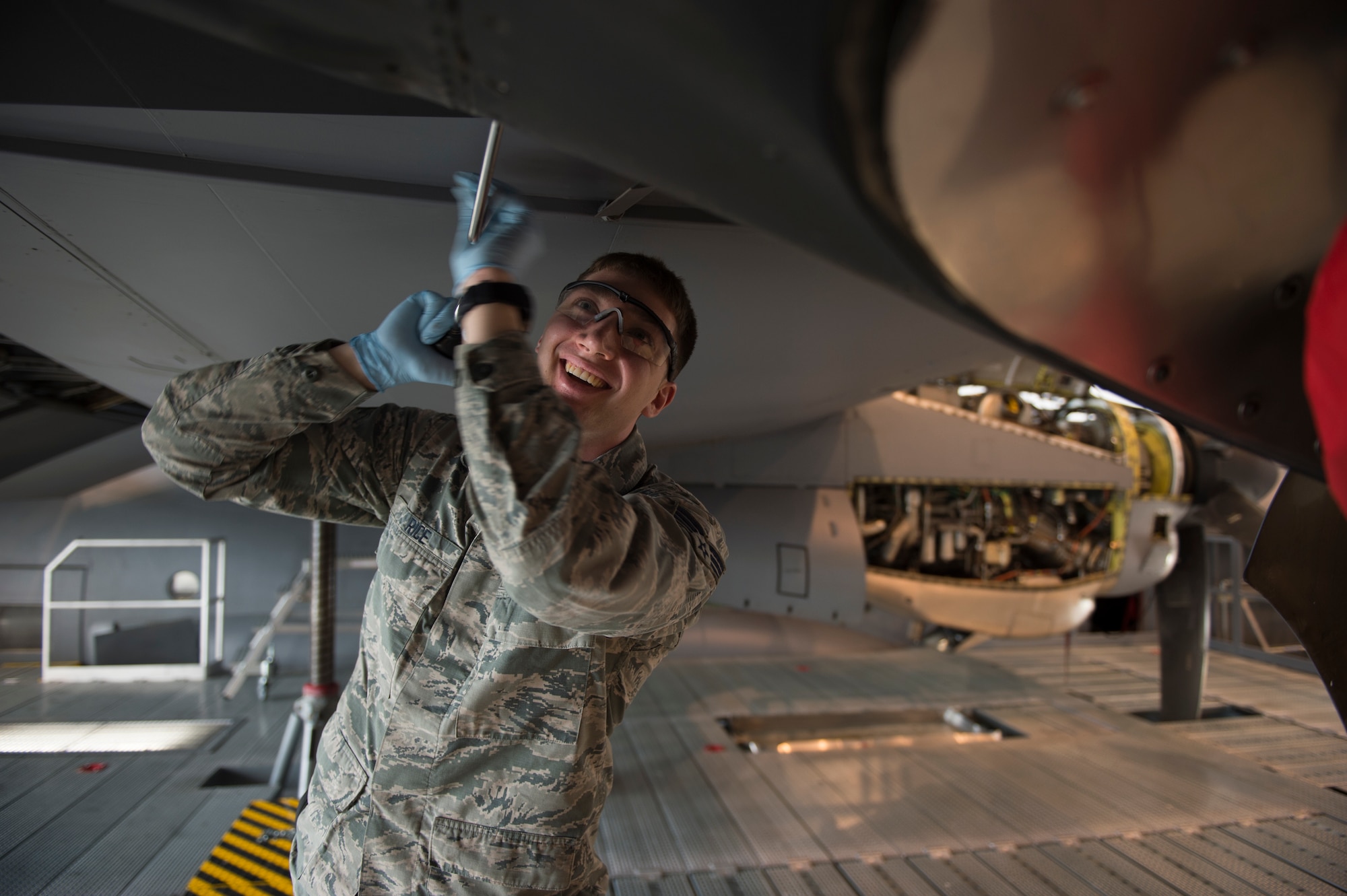 U.S. Air Force Senior Airman Joshua Rice, 86th Maintenance Squadron crew chief, unscrews a panel from a C-130J Super Hercules during an isochronal inspection on Ramstein Air Base, Germany, April 10, 2018. Isochronal inspections ensure aircraft remain reliable and operational for the Air Force’s missions. (U.S. Air Force photo by Senior Airman Joshua Magbanua)