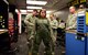 Cathy Felty, Florida’s Bay District schools Teacher of the Year, is fitted for a flightsuit by Airman 1st Class Aaron Cusick, Senior Airman Erin Terry, and Master Sgt. Andrew Peery, from the 325th Operations Support Squadron, prior to a T-38 Talon familiarization flight at Tyndall Air Force Base, Fla., April 9, 2018. Felty was flown in a T-38 to better familiarize her with Tyndall’s mission and the base’s impact on the local, state, and national arenas. She was flown after undergoing several safety briefings, medical screenings, and a mission brief. (U.S. Air Force photo by Airman 1st Class Isaiah J. Soliz/Released)