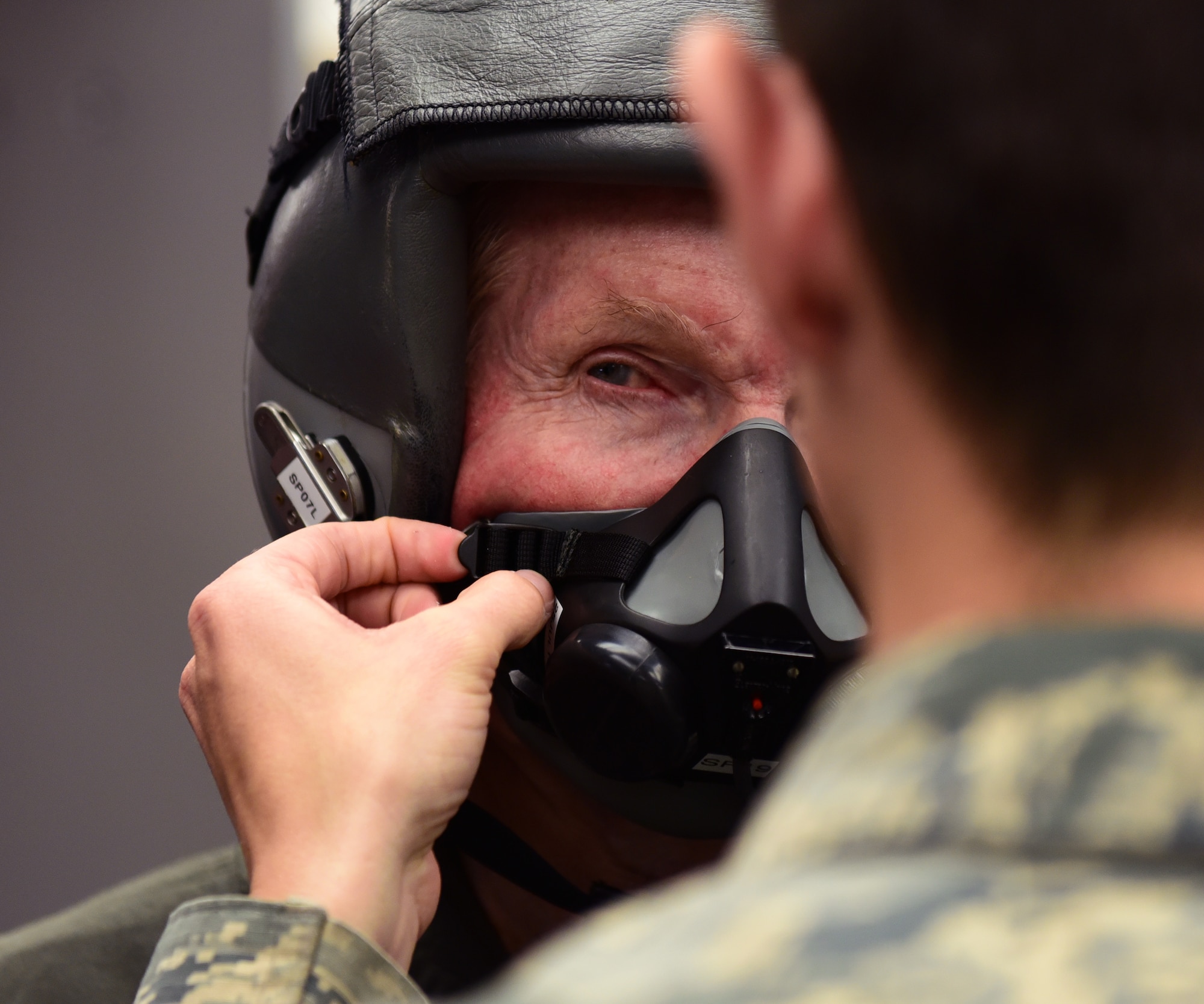 U.S. Senator Bill Nelson, of Florida, is fitted for flight gear by Airman 1st Class Aaron Cusick, 325th Operations Support Squadron aircrew flight equipment technician, prior to a familiarization flight at Tyndall Air Force Base, Fla., April 3, 2018. The senator was flown in a T-38 Talon after undergoing several safety briefings, medical screenings and a mission brief given by Col. Michael Hernandez, 325th Fighter Wing commander. (U.S. Air Force photo by Airman 1st Class Isaiah J. Soliz/Released)