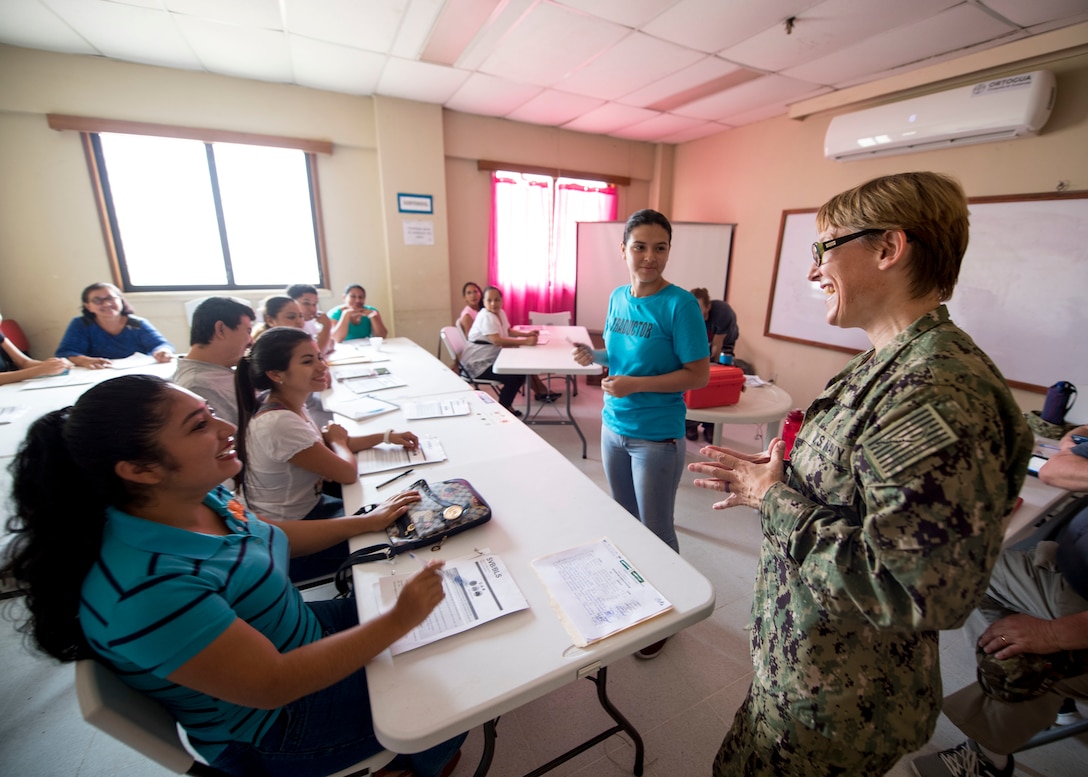 A Navy officer teaches a  Basic Life Support class to Guatemalan medical personnel.