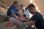 A doctor checks a patient in Guatemala