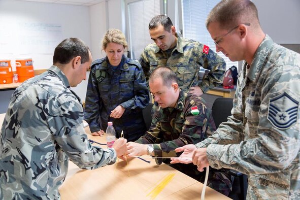 Students from partner nations work together in a joint exercise at the Inter European Air Forces Academy. The Air Force Culture and Language Center seeks to form a corps of general purpose Airmen to take on missions around the world through its Language Enabled Airman Program. (Courtesy photo, AFCLC)