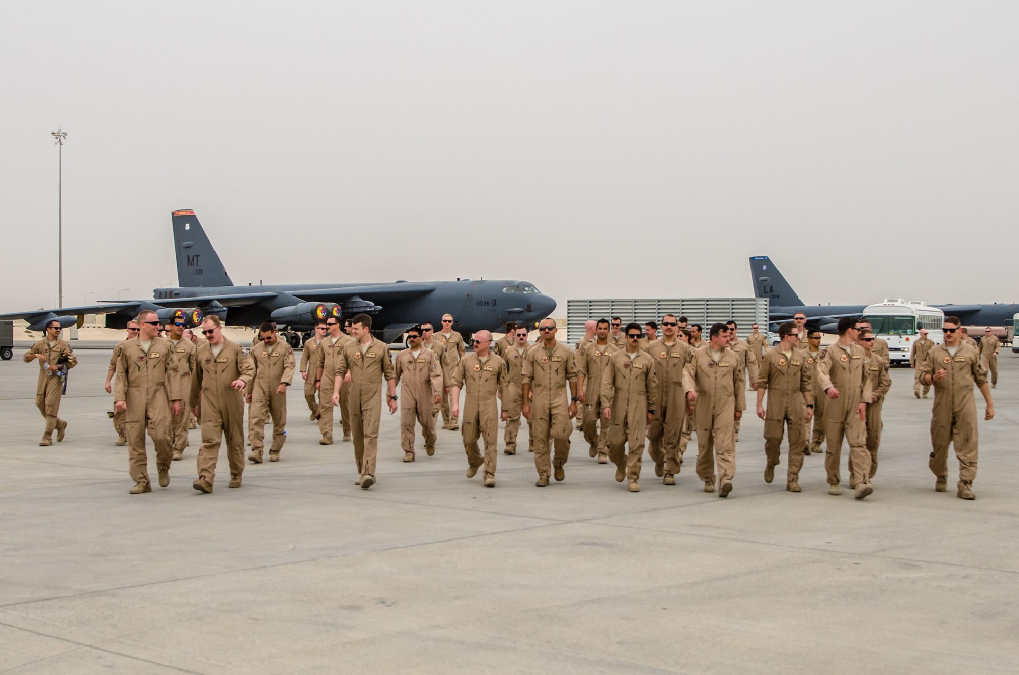 A B-52 Stratofortress aircraft assigned to the 69th Expeditionary Bomb Squadron lands at Al Udeid Air Base, Qatar, April 8, 2018, signifying the completion of its last sortie here before turning over the bomber mission to the newly arrived B-1B Lancer.  Since its arrival in 2016, the BUFF flew more than 1,800 sorties and employed nearly 12,000 weapons against ISIS and Taliban targets. (U.S. Air Force photo by Staff Sgt. Patrick Evenson)