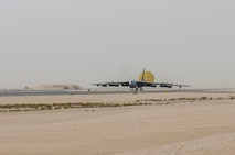 A B-52 Stratofortress aircraft assigned to the 69th Expeditionary Bomb Squadron lands at Al Udeid Air Base, Qatar, April 8, 2018, signifying the completion of its last sortie here before turning over the bomber mission to the newly arrived B-1B Lancer.  Since its arrival in 2016, the BUFF flew more than 1,800 sorties and employed nearly 12,000 weapons against ISIS and Taliban targets. (U.S. Air Force photo by Staff Sgt. Patrick Evenson)