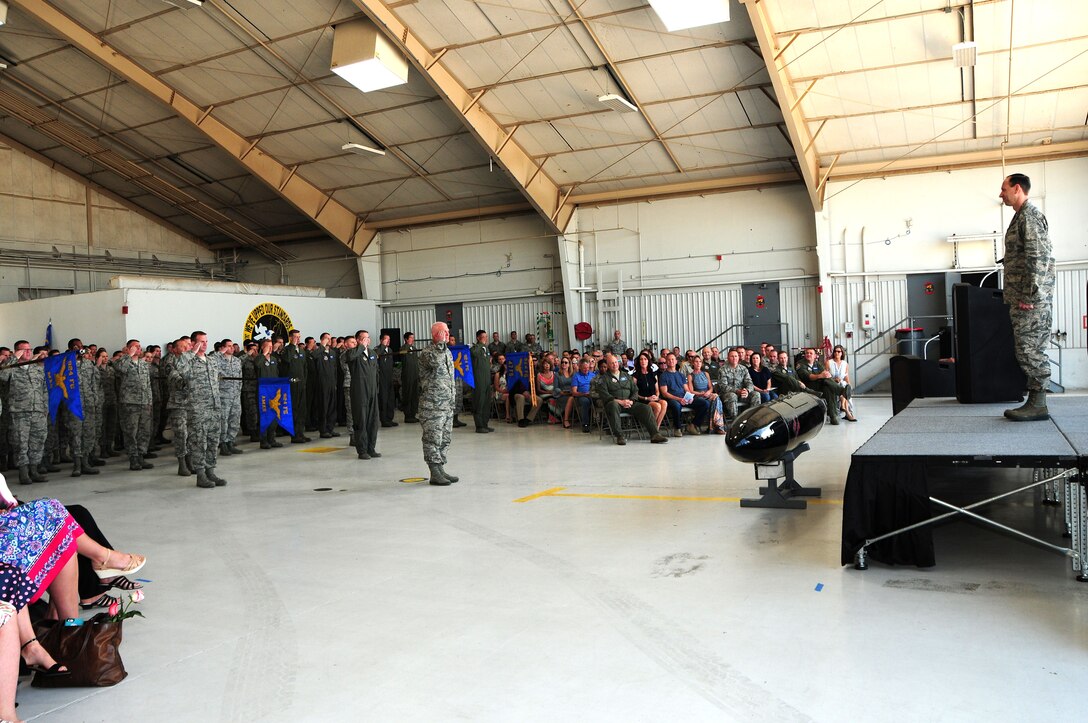 Col. Brian Cusson, 924th Fighter Group incoming commander, assumes command of the group from Col. Bryan Cook, 944th Fighter Wing commander, during a ceremony, April 7, 2018.