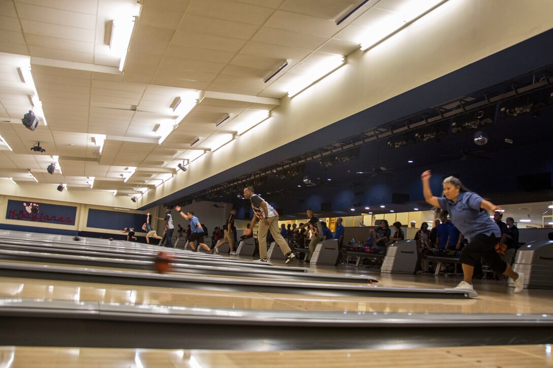 Competitors with various military installations compete in the Hawaii All Military Championships, Marine Corps Base Hawaii, April 4, 2018. The tournament consisted of all branches bowling a total of 24 games in the span of 4 days, each day at a different military installation. The tournament built morale, camaraderie, and sportsmanship among the armed forces. (U.S. Marine Corps photo by Lance Cpl. Matthew Kirk)