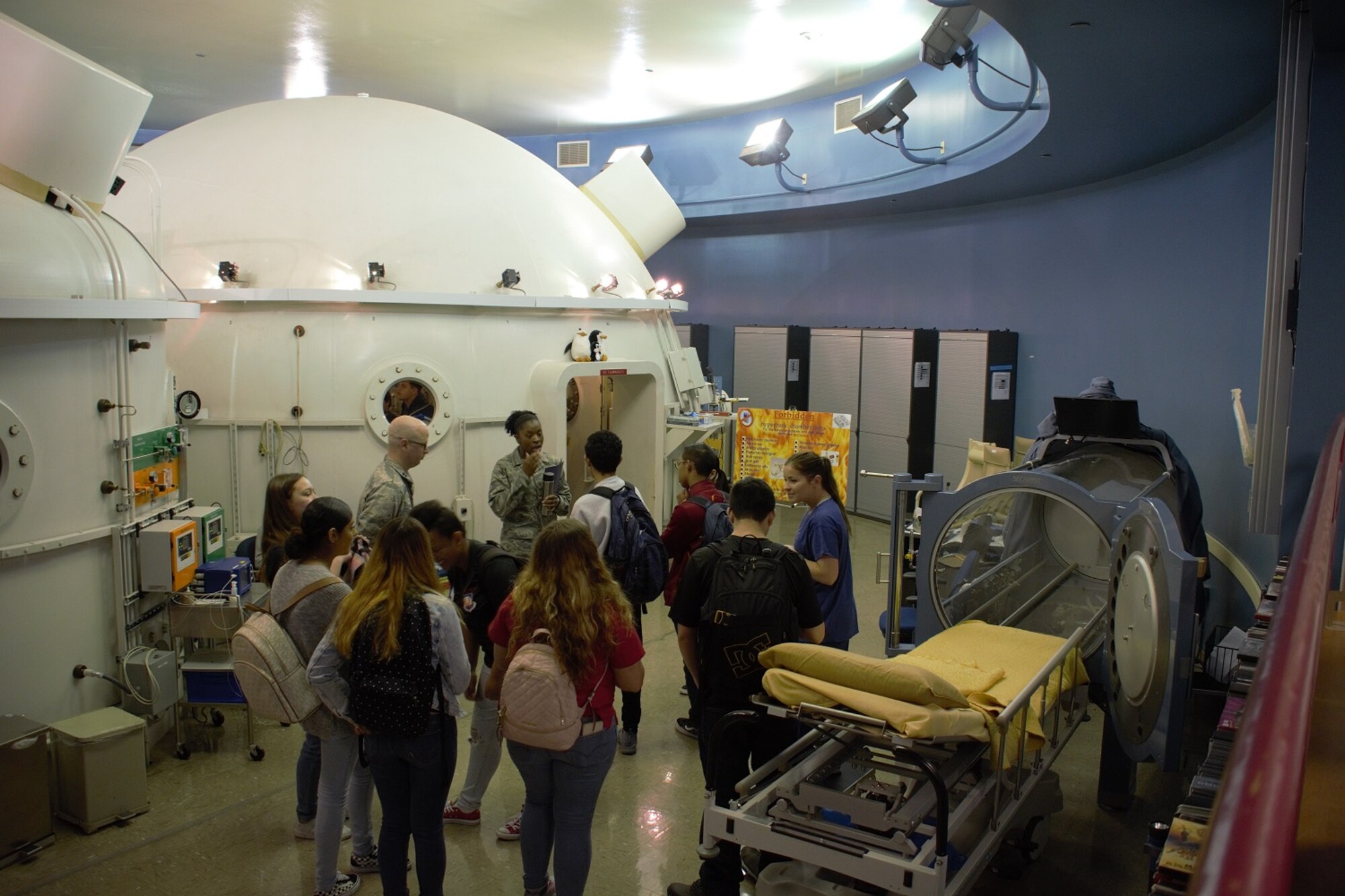 Students from De Anza High School tour the hyperbaric chamber at David Grant USAF Medical Center March 29 at Travis Air Force Base, Calif. The students attended the tour to have a work-based understanding of the workings of an operating hospital.