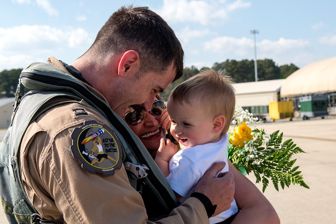 A captain from the 336th Fighter Squadron greets his family after returning from deployment, April 11, 2018, at Seymour Johnson Air Force Base, North Carolina.