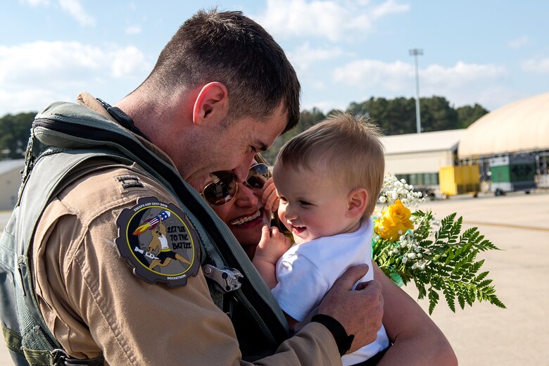 A captain from the 336th Fighter Squadron greets his family after returning from deployment, April 11, 2018, at Seymour Johnson Air Force Base, North Carolina.