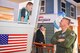 Col. Aaron Blum, 75th Air Base Wing, interacts with Skip Waugh, a 5th grader from Snow Horse Elementary in Kaysville, Utah, during the Junior Achievement City's grand opening of their model air traffic control tower in Salt Lake City. The tower was built courtesy of Hill Air Force Base. Junior Achievement City is an interactive learning environment where students learn about real-life careers. (U.S. Air Force photo by Cynthia Griggs)