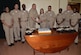 NHCC Command Master Chief Anthony Petrone, left, and Chief Petty Officer Jami Tankiss, center, cut the cake during a ceremony March 30 at NHCC celebrating the 125th birthday of the Navy’s Chief Petty Officer rank. Appearing in the photo, from left to right: Senior Chief Petty Officer Jacqueline Colbourne, Senior Chief Petty Officer Greg Lassiter, Chief Petty Officer Anthony Johnson, Petrone, Tankiss, Chief Petty Officer Freddy Mejia, Chief Petty Officer Ashley Cooper, Chief Petty Officer Sean Reeves and Chief Petty Officer Capricia Williams.