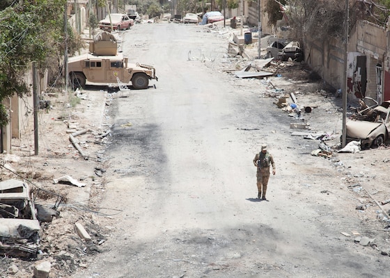 Iraqi Security Forces member provides security near patrol base in Mosul, June 22, 2017 (U.S. Army/Rachel Diehm)