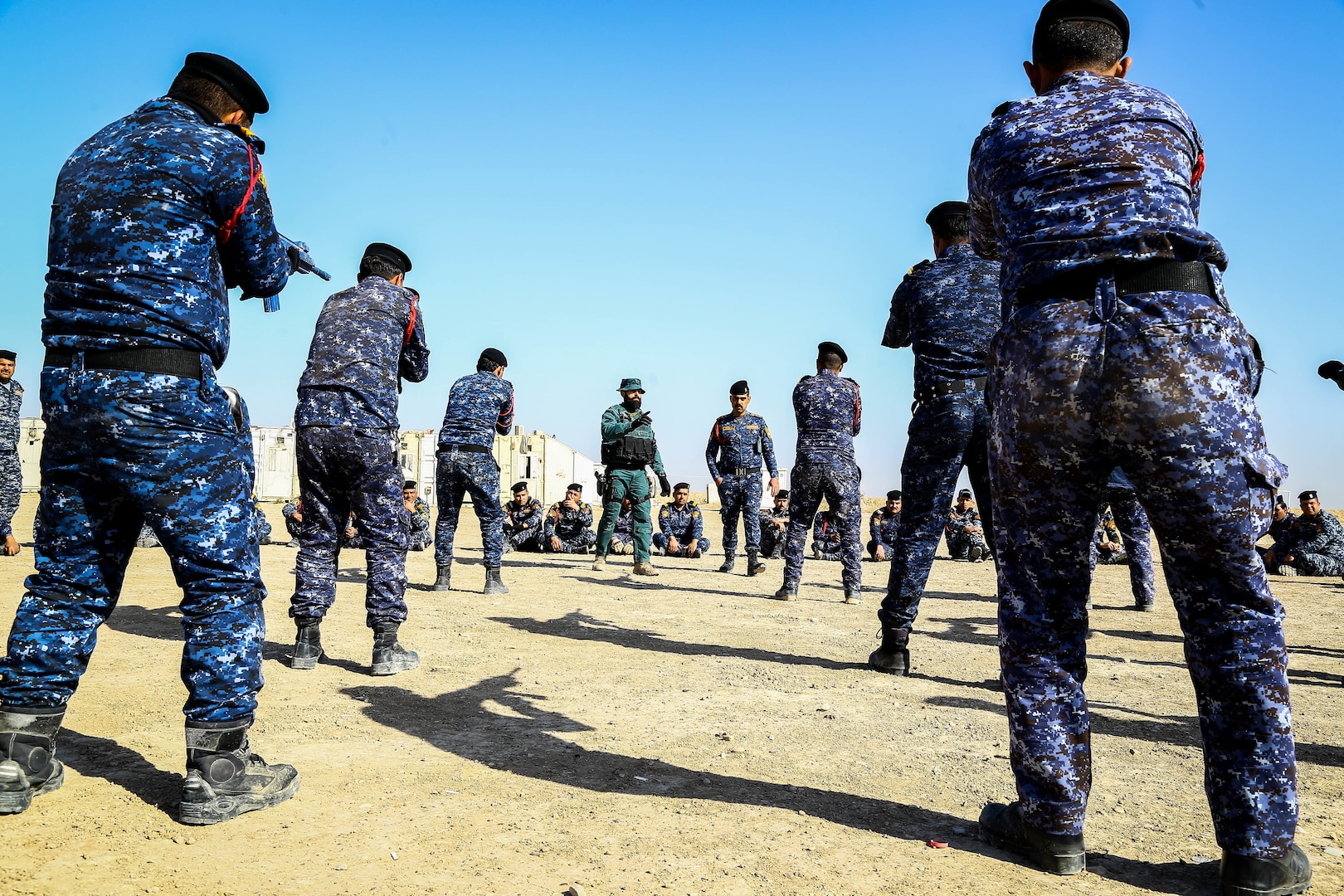 Iraqi federal police attached to 1st Battalion conduct class on squad tactics at Besmaya Range Complex, Iraq, February 8, 2018 (U.S Army/Antonio Lewis)