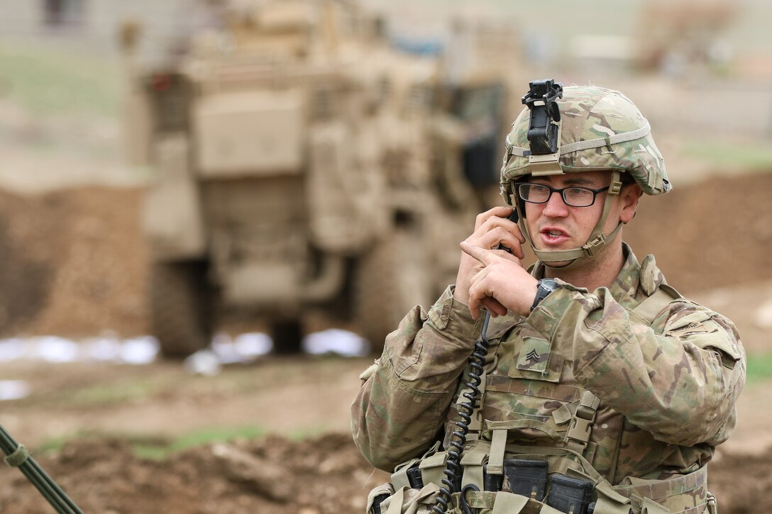 Soldier assigned to 2nd Brigade Combat Team, 82nd Airborne Division, checks mortar data during fire mission in support of 9th Iraqi Army Division near Al Tarab, Iraq, during offensive to liberate West Mosul from ISIS, March 18, 2017 (U.S. Army/Jason Hull)