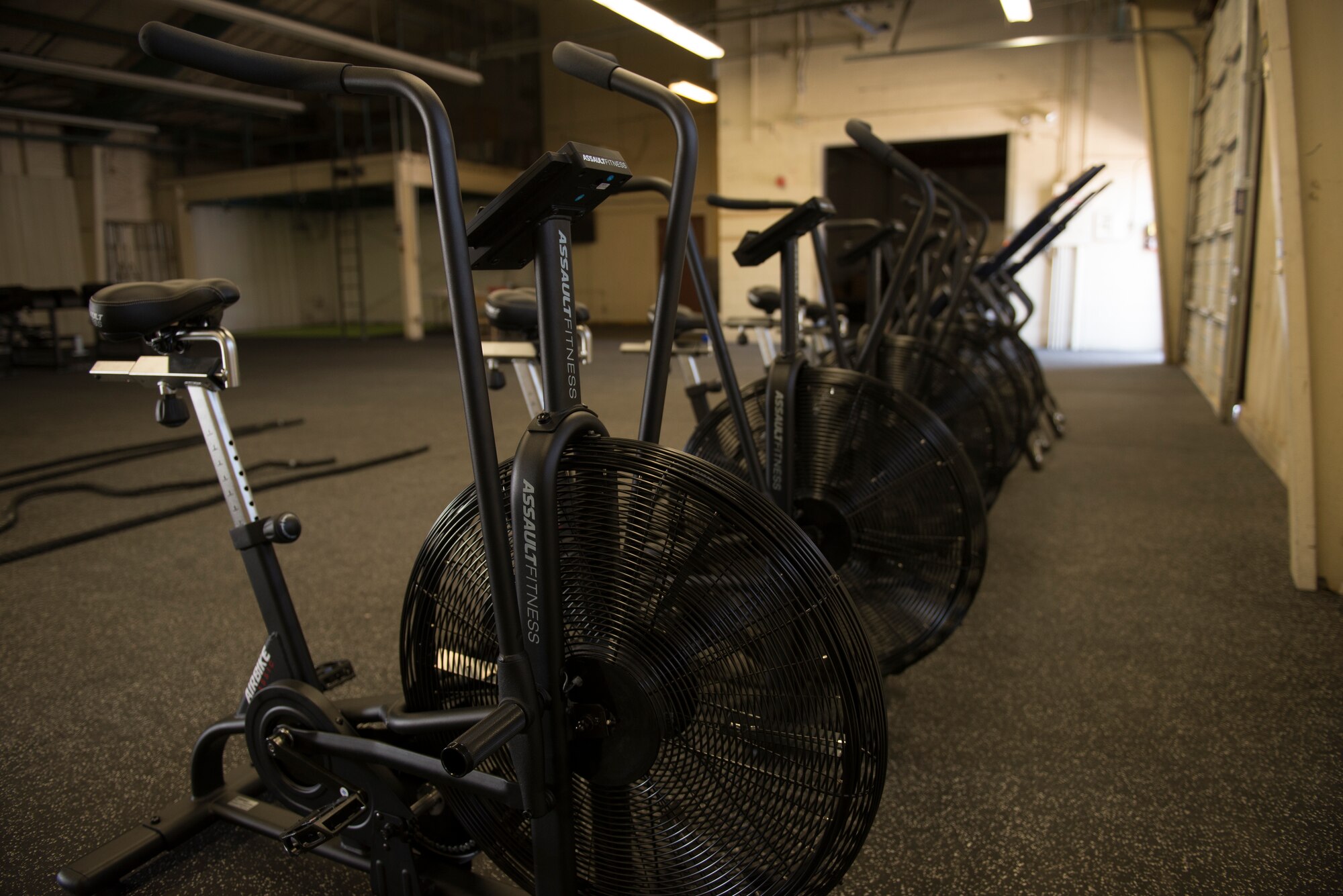 Exercise equipment lines the walls of the Tactical Integrated Training and Nutrition Arena April 9, 2018, at Luke Air Force Base, Ariz. Luke medical professionals from the Human Performance Team will use equipment like stationary bikes, row machines, and dumb bells to develop physical fitness solutions for the highly active work and lifestyles of Airmen. (U.S. Air Force photo by Senior Airman Ridge Shan)
