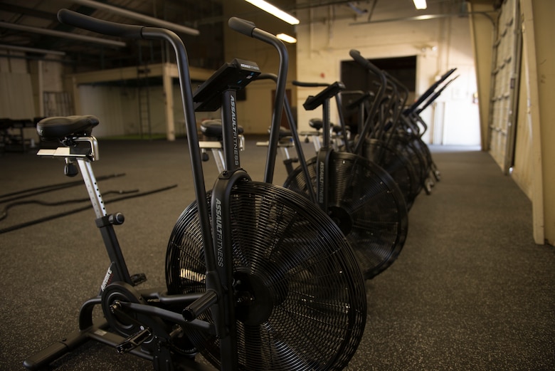 Exercise equipment lines the walls of the Tactical Integrated Training and Nutrition Arena April 9, 2018, at Luke Air Force Base, Ariz. Luke medical professionals from the Human Performance Team will use equipment like stationary bikes, row machines, and dumb bells to develop physical fitness solutions for the highly active work and lifestyles of Airmen. (U.S. Air Force photo by Senior Airman Ridge Shan)